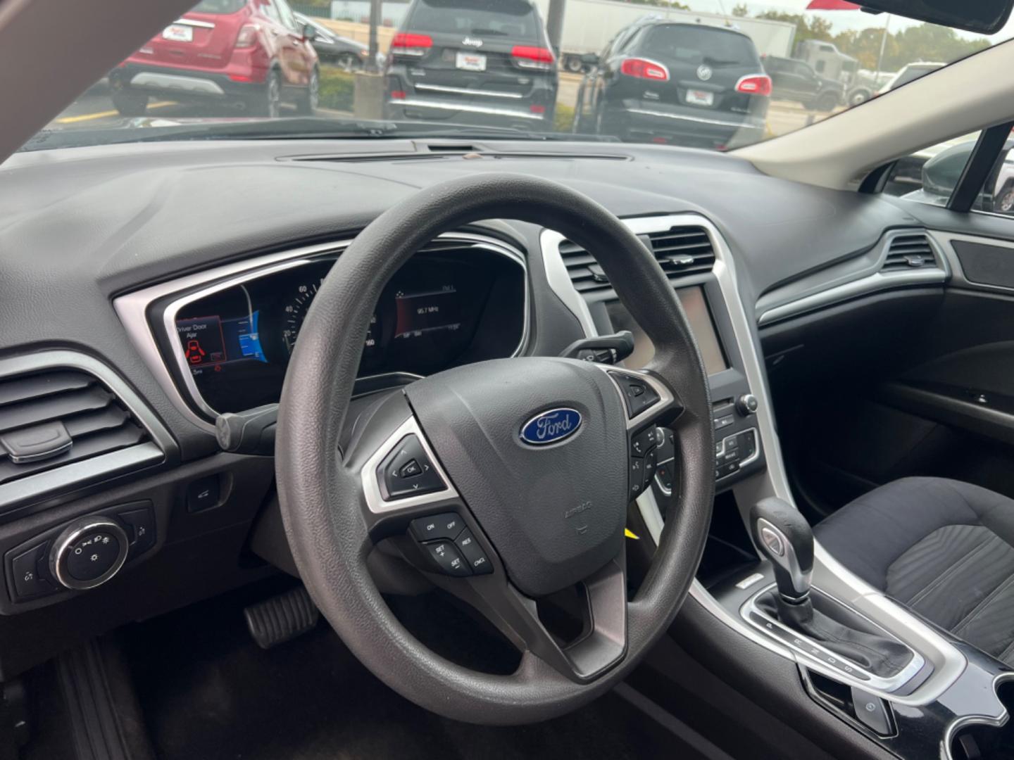 2016 GRAY Ford Fusion SE (3FA6P0HD4GR) with an 1.5L L4 DOHC 16V engine, 6-Speed Automatic transmission, located at 420 I-35E, Lancaster, TX, 75146, (469) 297-4144, 32.593929, -96.823685 - Photo#1